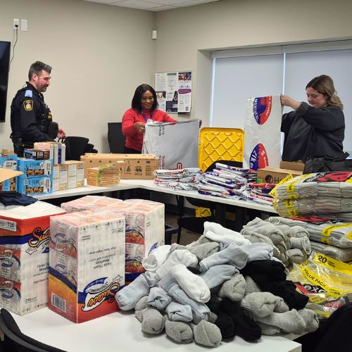 People sorting donations.
