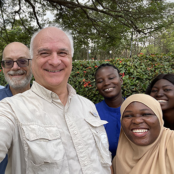 Jeff Grischow and Mark Terry with Ghanaian youth