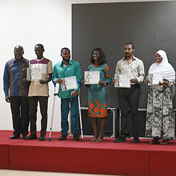 Magnus Mfoafo-M'Carthy posing with young filmmakers