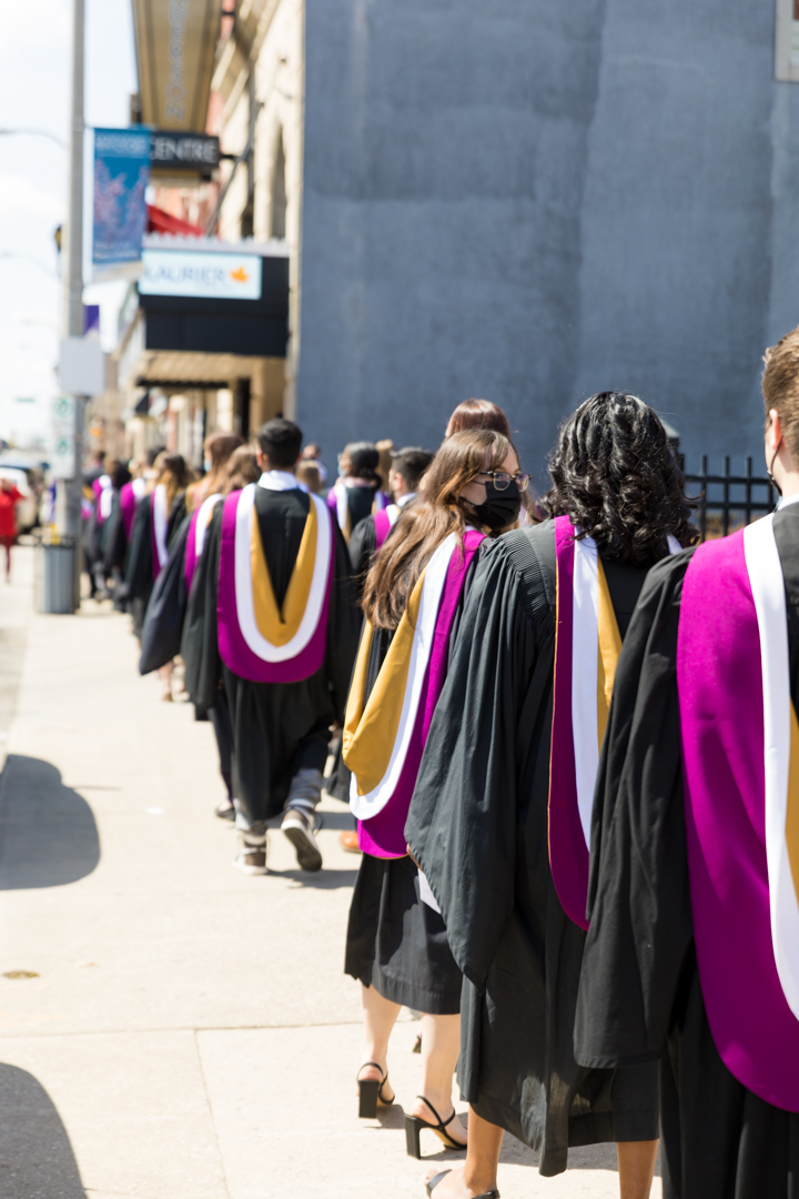 grads wait to enter Sanderson Centre