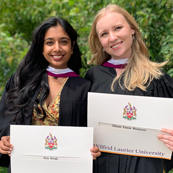 two students graduating