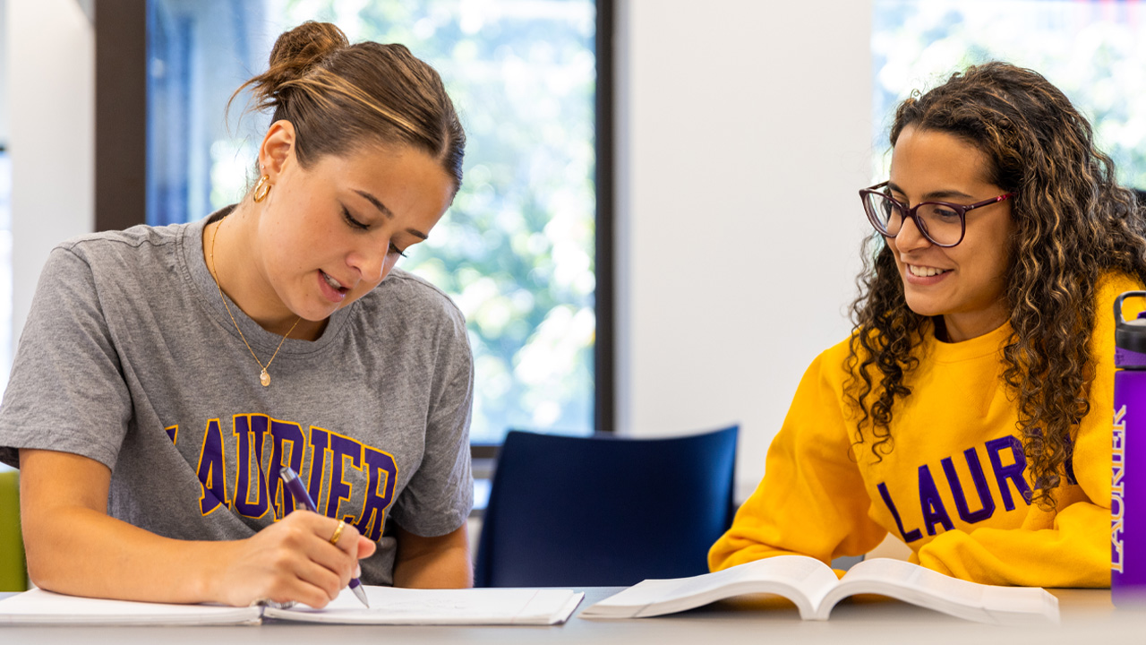 two female students in class